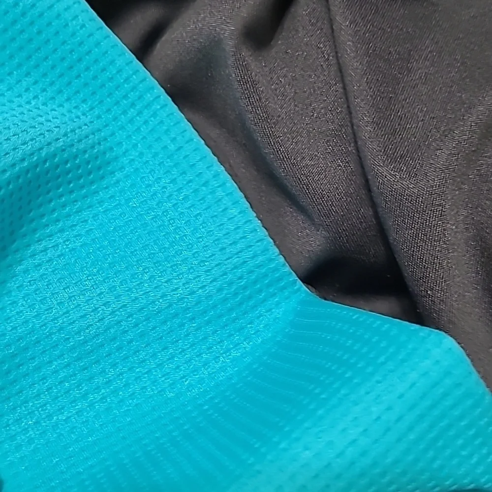 Under Armour Grey Shirt with Teal Blue Waffle Patterned Sleeves size Y-Large